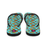 "Chancletas" (Flip Flops) con representación artística de los caracoles en la arena de Puerto Rico.
