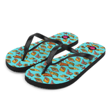 "Chancletas" (Flip Flops) con representación artística de los caracoles en la arena de Puerto Rico.