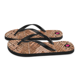 Chancletas (flip flops) con hojas de palmas de Puerto Rico en otoño.